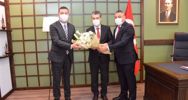AK Parti Trabzon İl ve İlçe Yönetim Kurullarından Kaymakam Tolga Toğan'a ziyaret
